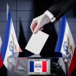 Iowa flags, hand dropping ballot card into a box – voting, elect