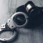 Legal law concept image – gavel and handcuffs